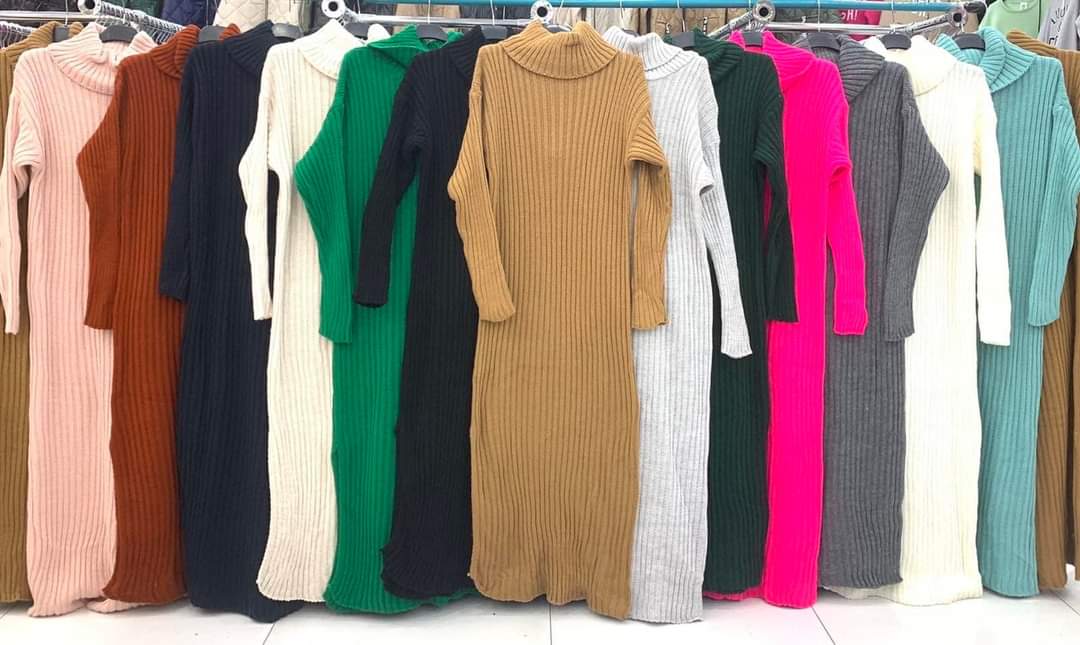 A striped sweater dress with a turtleneck - Image 4